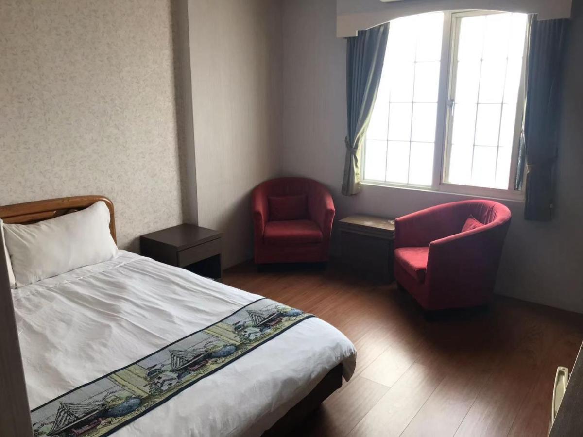 Red Roof B&B Цзиньху Экстерьер фото